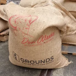 Jutezak met het logo van Don Alexis Coffee en importeur Grounds